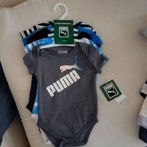 Brand new 5 pack of PUMA onsies size 3-6months